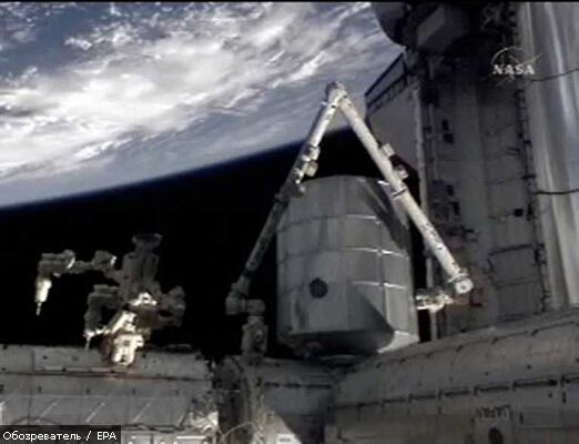 Астронавты Discovery приступили к работе в открытом космосе