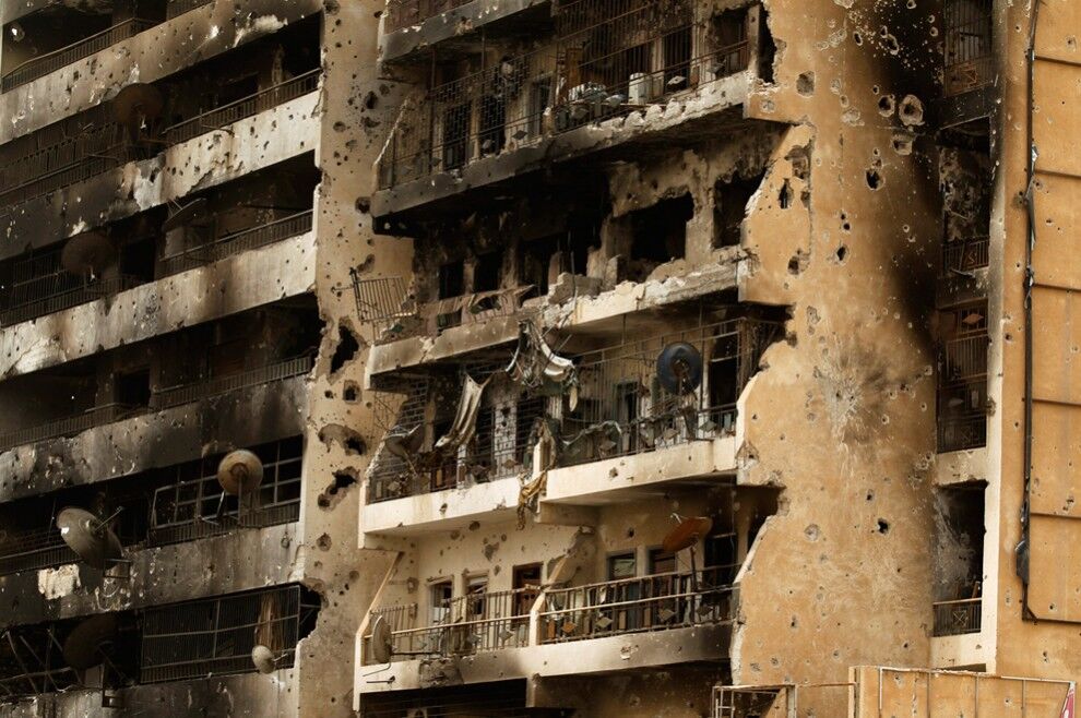 2. Разрушенное здание на улице Триполи в Мисрате. (Reuters/Zohra Bensemra)