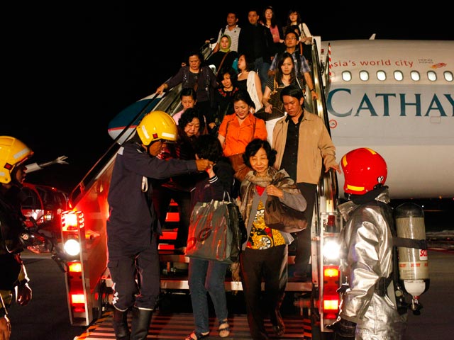 Журналист снял фоторепортаж изнутри горящего самолета: пассажиры готовились к смерти