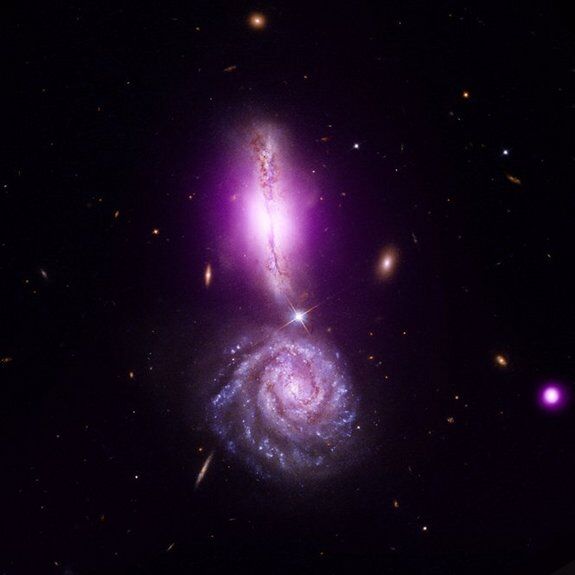 Столкновения галактик порождают поразительные эффекты