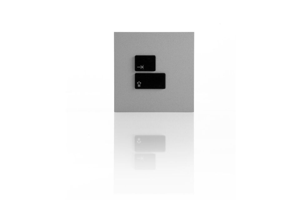 Созданы стильные выключатели света с кнопками от клавиатуры. Фото