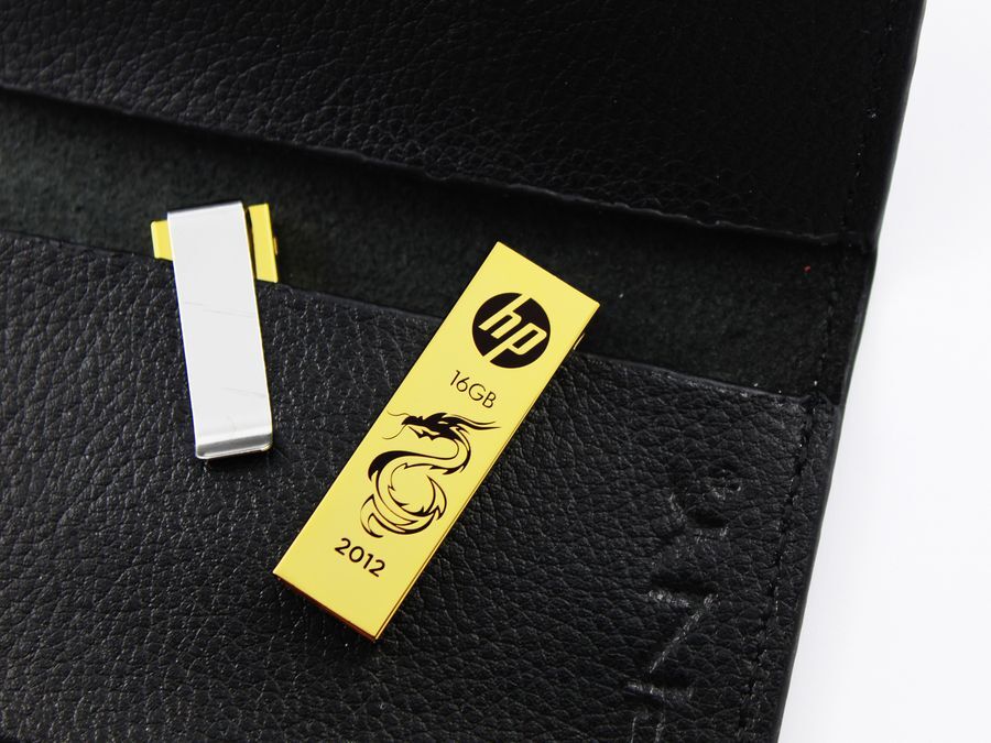 Выпущены драконьи USB-флешки с позолотой. Фото  