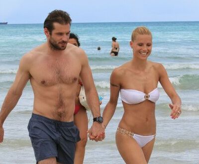 Мишель Хунцикер и Томас Труссарди позируют в Майами