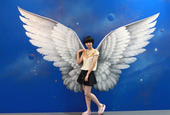 Носороги и акулы на выставке 3D-картин в Китае. Фото 