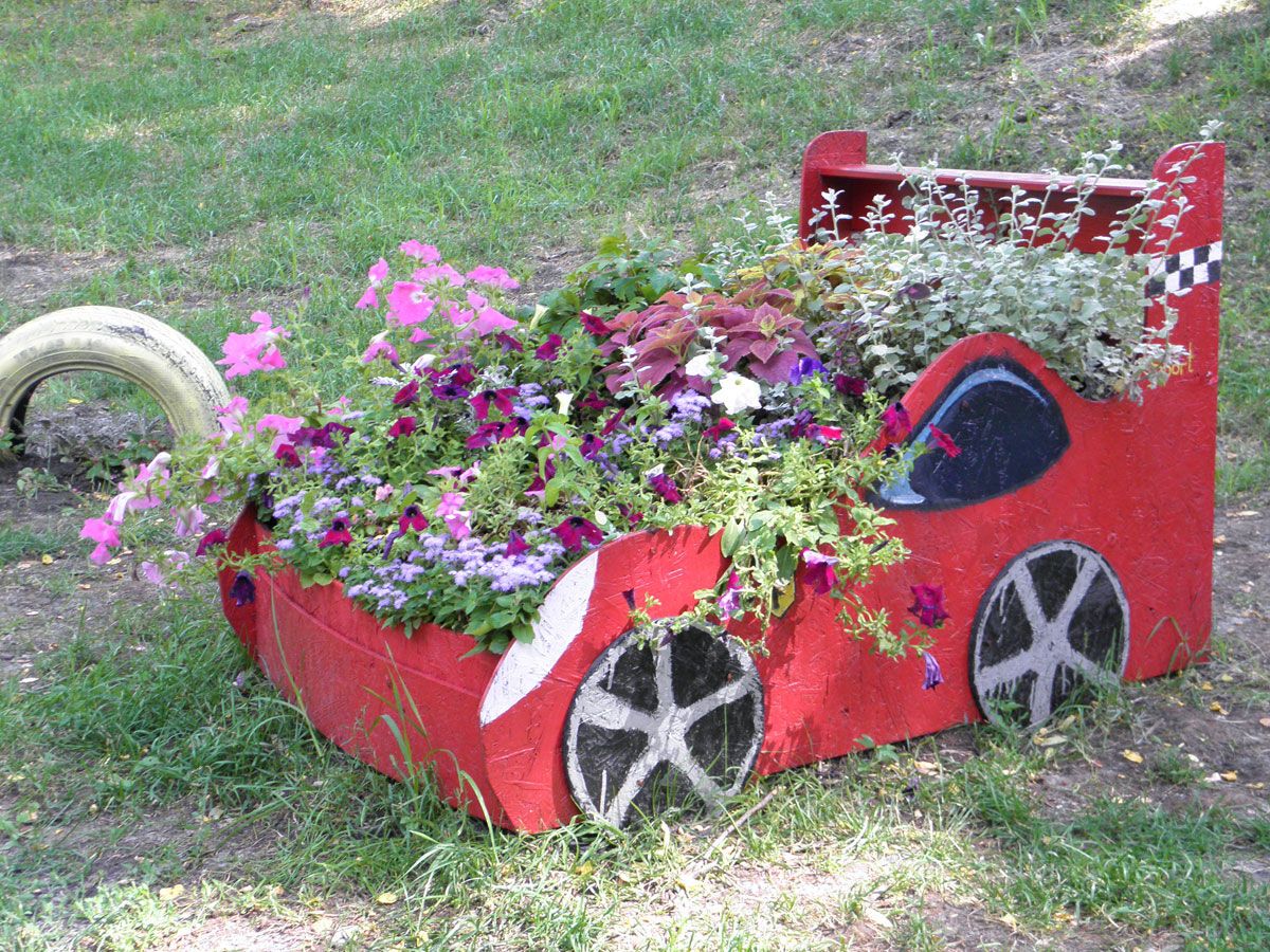 Шины, фары, петуния и бегония: выставка зеленых авто