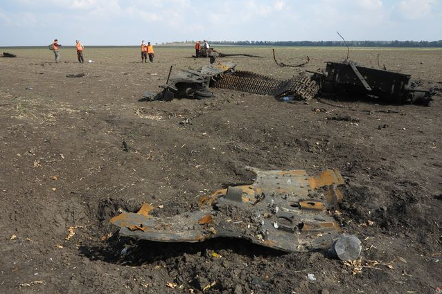 Появились душераздирающие фото из-под Иловайска, где нашли 150 неопознанных тел