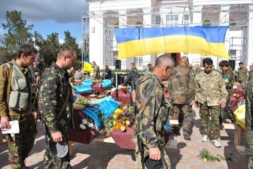 На Луганщине похоронили погибших в день объявления перемирия 28 неизвестных украинских военных