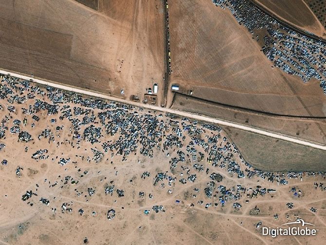 Лучшие фотографии 2014 года со спутника: Майдан, беженцы в Сирии и вулканы