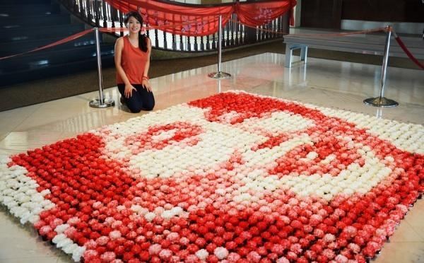 Китаянка нарисовала портрет Адэль из 1500 свечей