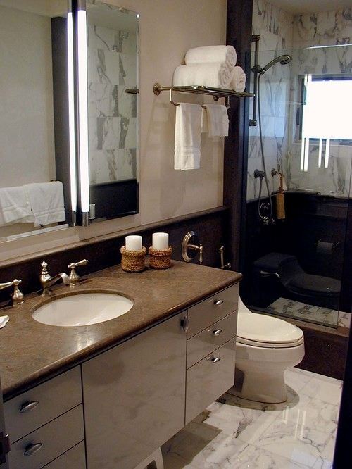 10 способов компактного хранения полотенец в ванной