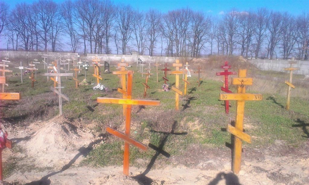 Поисковая группа Майдана нашла под Киевом безымянные могилы