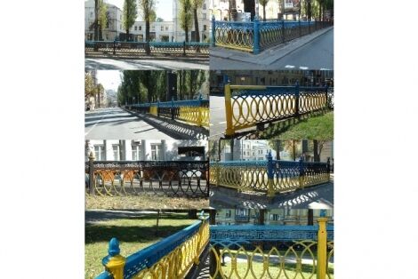 Возмущенный киевлянин перекрасил сине-желтый забор в центре столицы в черный цвет