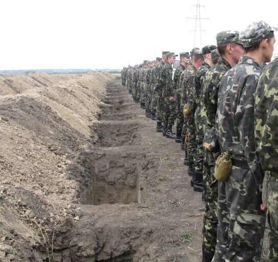 Солдат АТО десятками хоронят в безымянных могилах