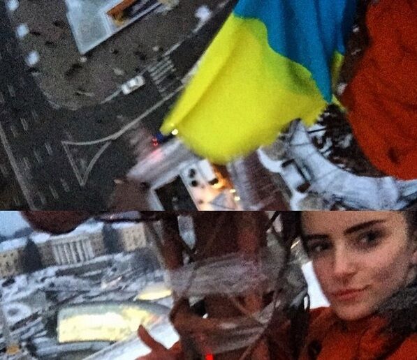 На шпиле высотки на Майдане появился украинский флаг: фотофакт