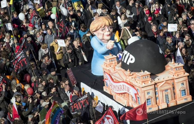 В Берлине около 100 тысяч человек митинговали против торговли с США и Канадой