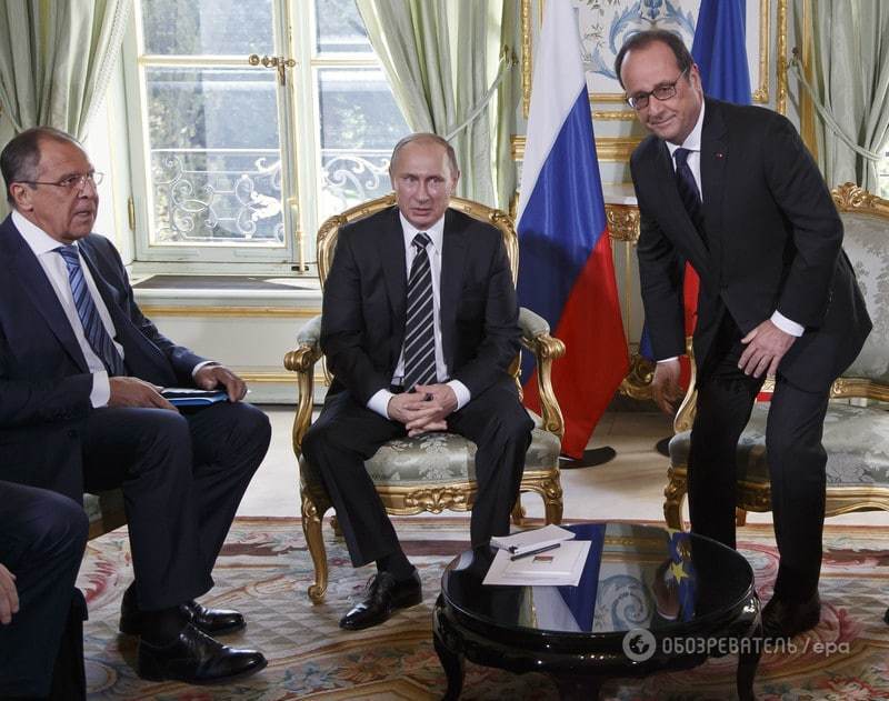 В ожидании встречи с Порошенко: фотографы "поймали" эмоции Путина