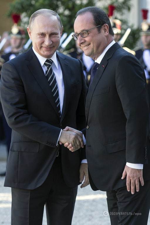 В ожидании встречи с Порошенко: фотографы "поймали" эмоции Путина в Париже