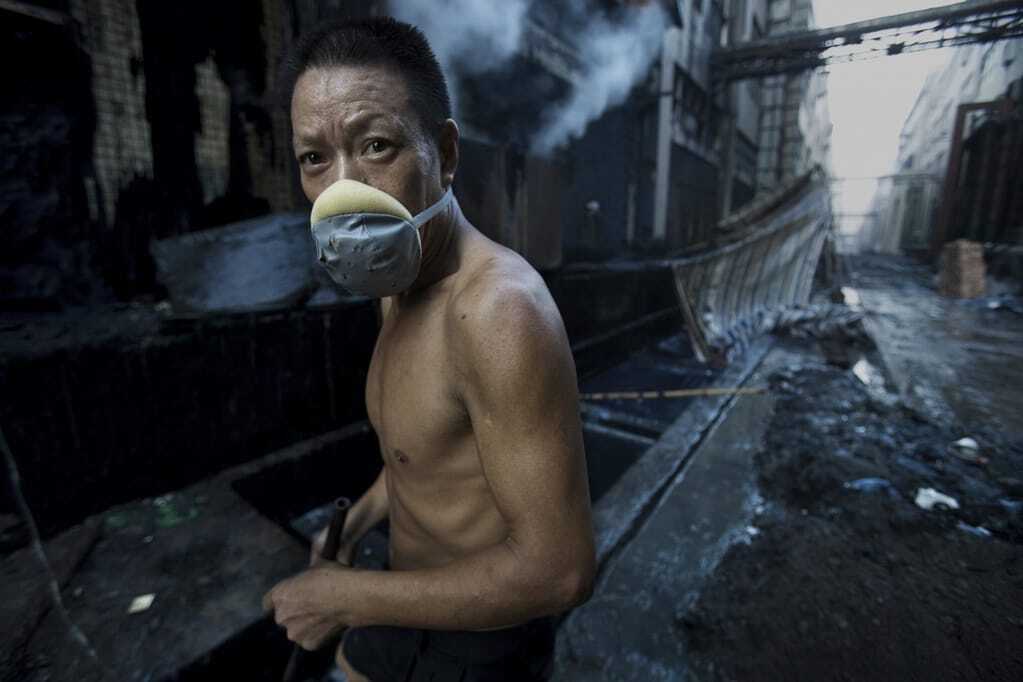Фотограф показал, чего стоило Китаю его экономическое чудо: опубликованы фото
