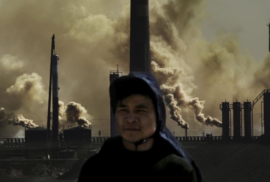 Фотограф показал, чего стоило Китаю его экономическое чудо: опубликованы фото