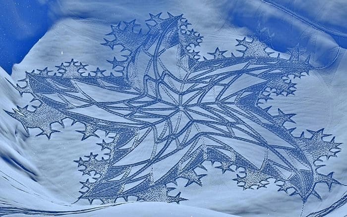 Гігантські візерунки на снігу: художник створив шедевр у Сибіру