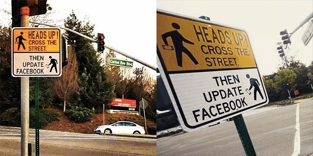 В США установили дорожный знак для Facebook-пешеходов
