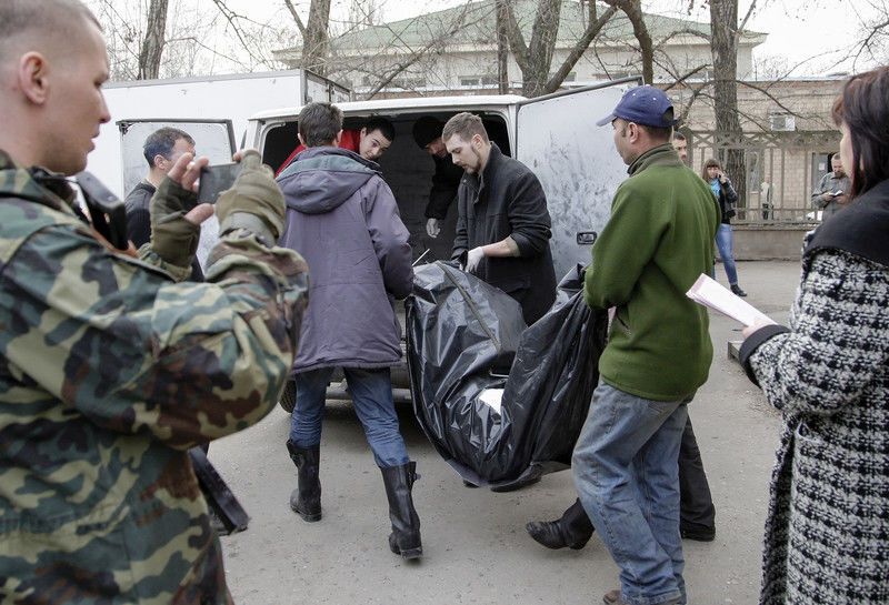 Боевики "ДНР" отдали 22 тела погибших бойцов АТО: фотофакт
