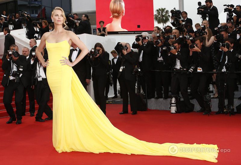 Невероятная красотка! 39-летняя Шарлиз Терон в желтом платье покорила Канны