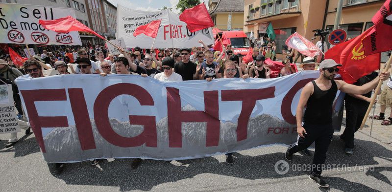 "До біса G7! Я люблю Путіна!" У Німеччині відбулася багатотисячна акція антиглобалістів