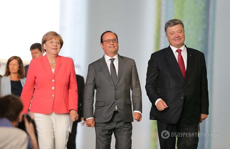 У Берліні пройшли переговори Порошенка, Меркель і Олланда: перші фото