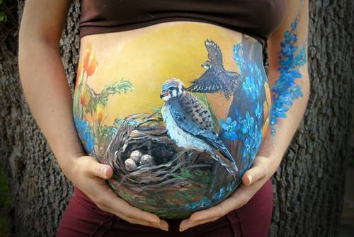 Разрисованные беременные животики: красивые фото