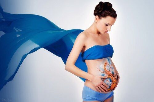 Разрисованные беременные животики: красивые фото 