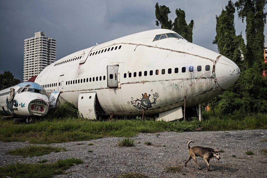 Жизнь на кладбище самолетов в Таиланде: удивительные фото