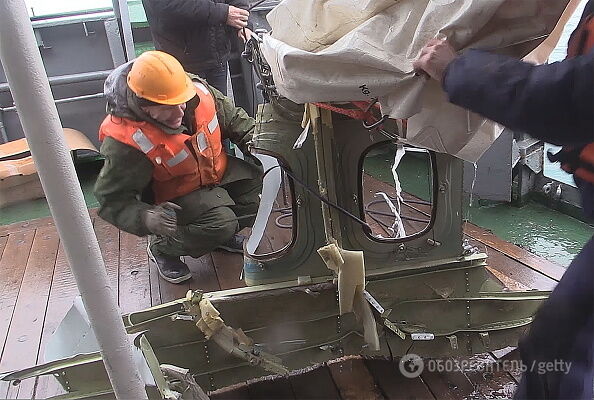 Крушение Ту-154: страшные находки спасателей собрали в масштабном фоторепортаже