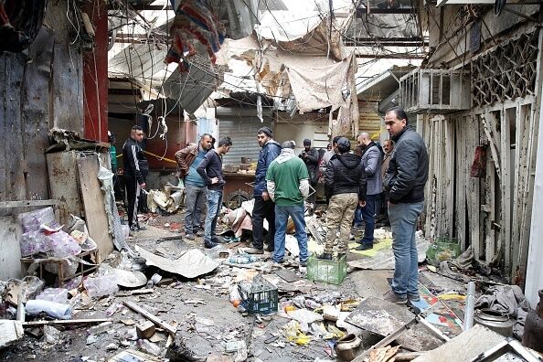Серия взрывов в Багдаде: страшные последствия теракта собрали в фоторепортаже