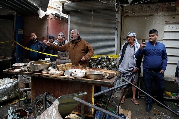 Серия взрывов в Багдаде: страшные последствия теракта собрали в фоторепортаже