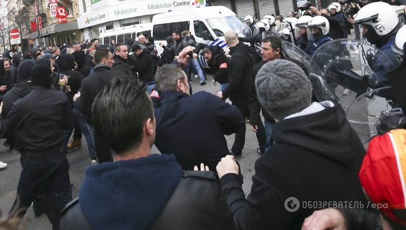 В Брюсселе на мирном собрании произошли столкновения: полиция применила водометы. Фоторепортаж