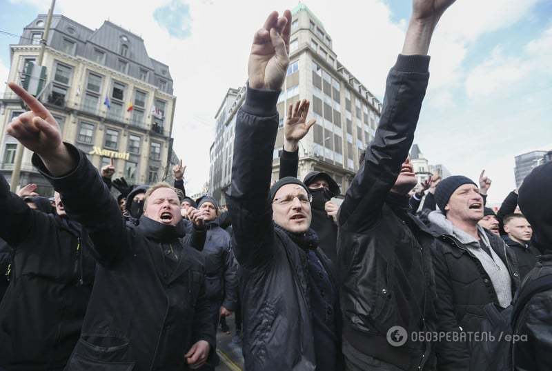 В Брюсселе на мирном собрании произошли столкновения: полиция применила водометы. Фоторепортаж