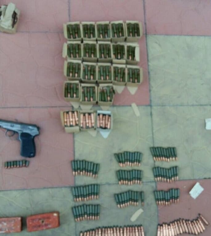 Автоматы, гранаты, патроны: в Киеве изъяли арсенал оружия. Фотофакт