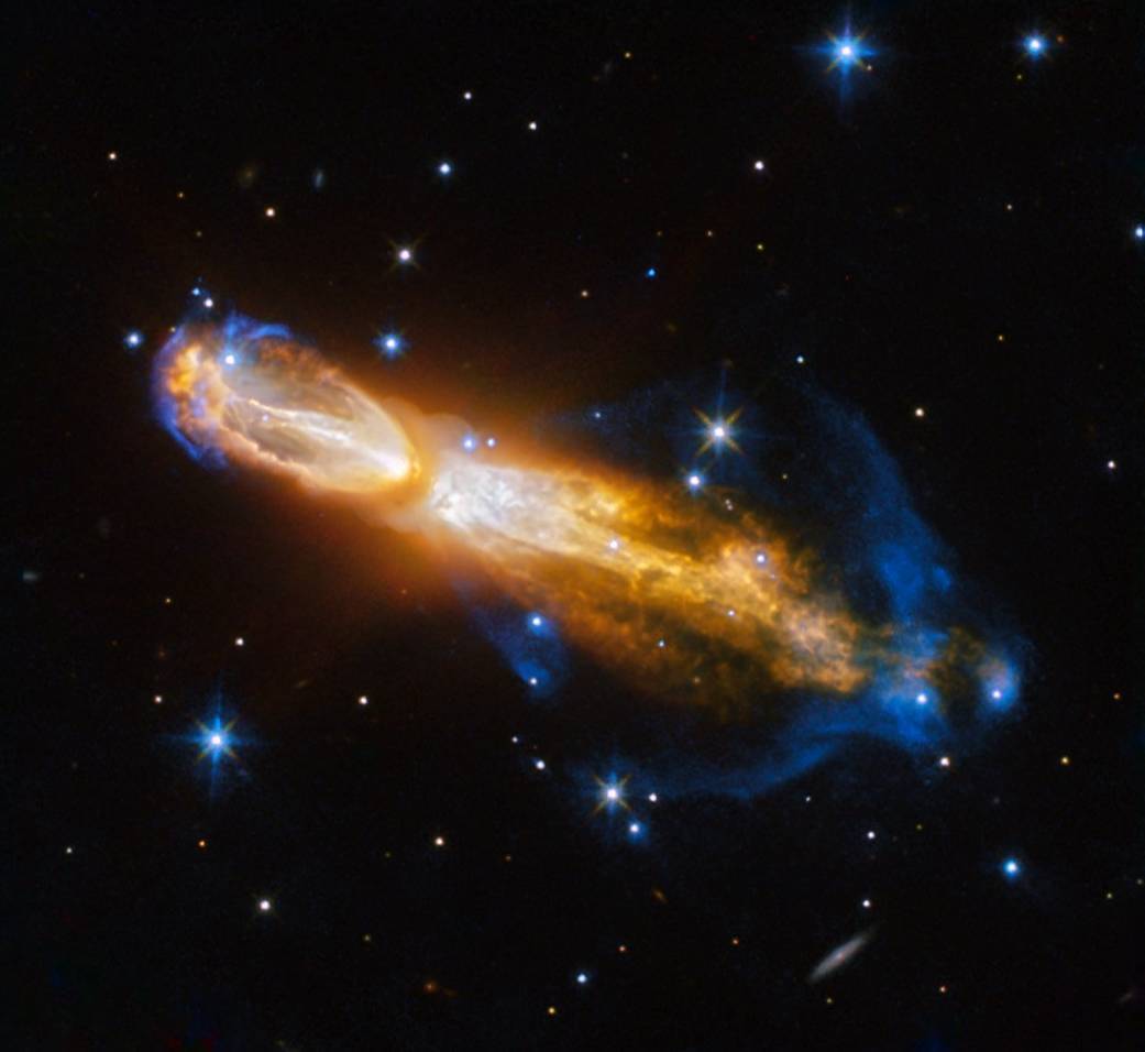 Brilliant star explosion with orange jets, blue shockwave