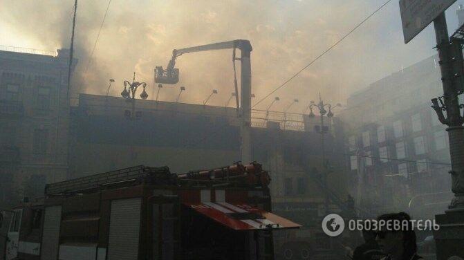 Пожар в бывшем гастрономе на Крещатике. По одной из версий здание подожгли ради строительства высотки