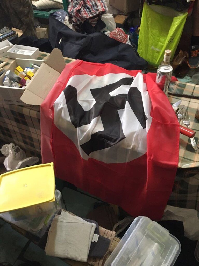 Прапор зі свастикою та бити: з'явилися фото з камер "торнадівців"
