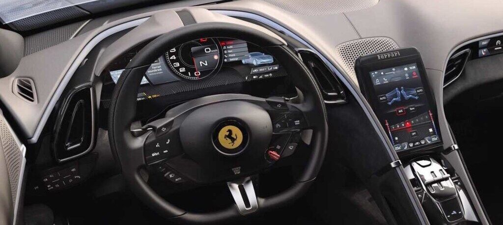 Цифровий щиток приладів і вертикальний центральний екран Ferrari Roma виглядають дуже сучасно