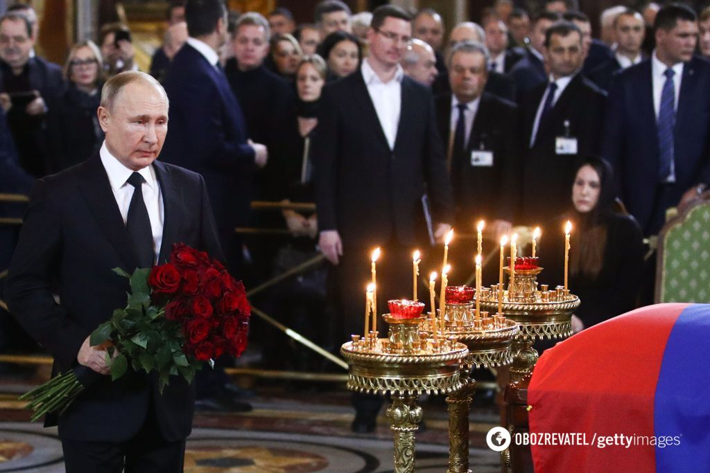 Путин на похоронах Лужкова