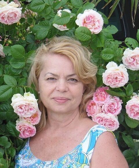 Мама Виталия и Евгения Гогунских