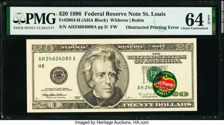 На банкноте рядом с портретом 7-го президента США Эндрю Джексона наклеен стикер поставщика фруктов