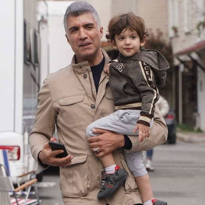 Озджан Дениз с сыном Кузеем.
