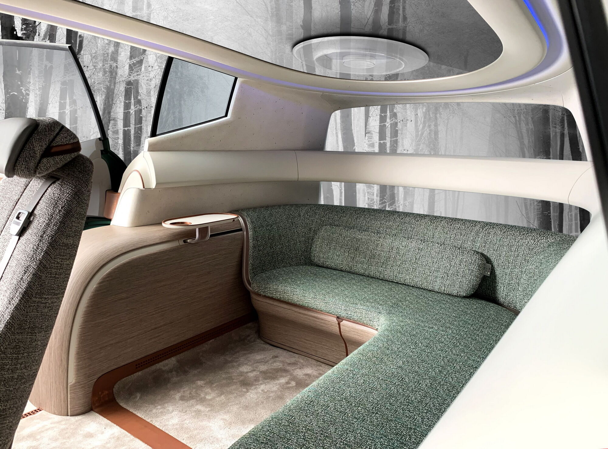 Два индивидуальных кресла можно вращать на 360 градусов, а в задней части разместили уютный диван