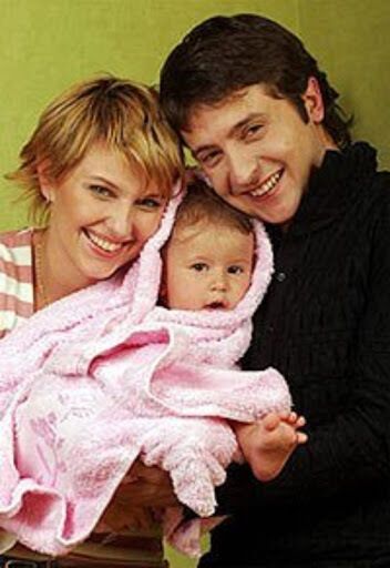 Елена и Владимир Зеленские с их дочерью Александрой.
