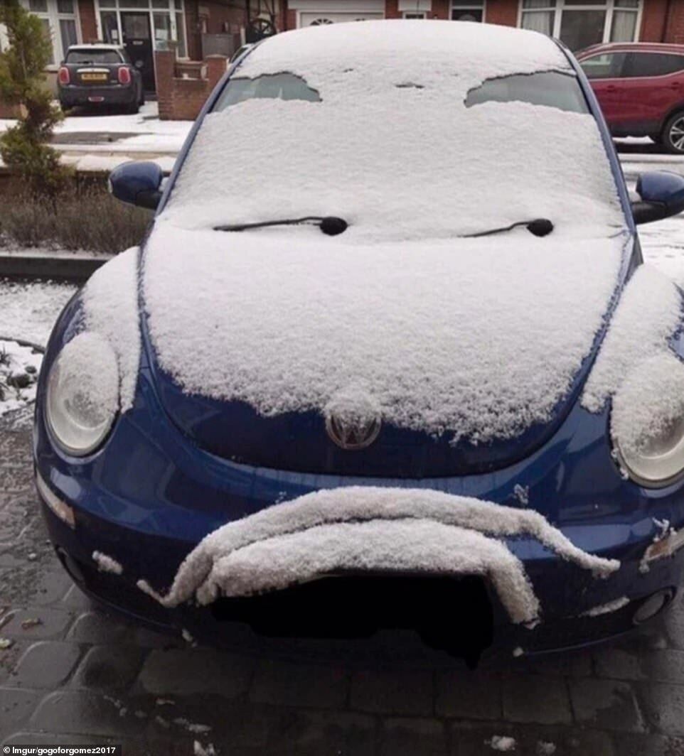 Машина, покрита снігом, засумувала