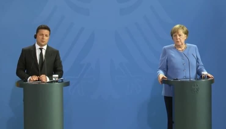 Зеленский и Меркель на брифинге.